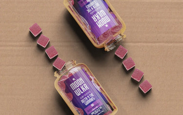 Bottles of Delta 9 gummies on Shipping Box