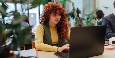 Person focused in on their computer working