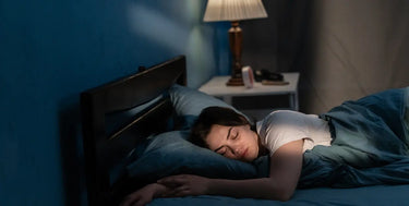 Person sleeping peacefully in bed on Delta 9