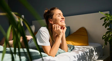 Woman in bliss with THC gummies for beginners