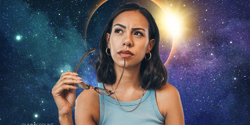 Woman thinking with the stars and galaxy behind her