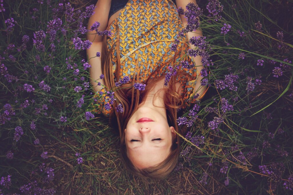 Woman laying in a field