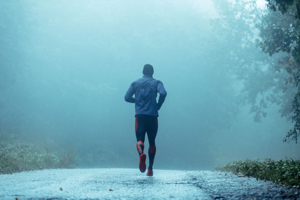 A man running in the rain