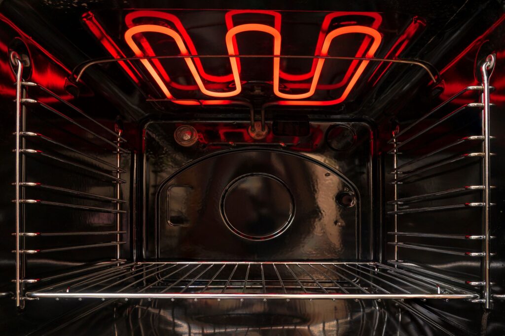 Inside of an oven with the heating element on